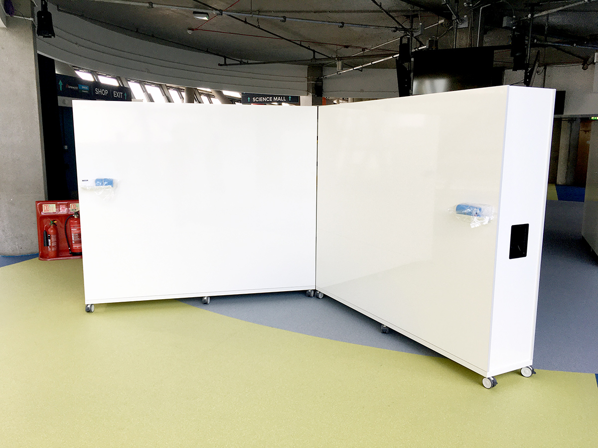 Mobile whiteboard partition with built in cupboards